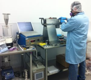 Technician-testing-on-site-pharmaceutical-plant