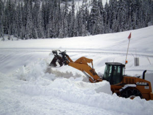 Front-end-loader-removing-snow